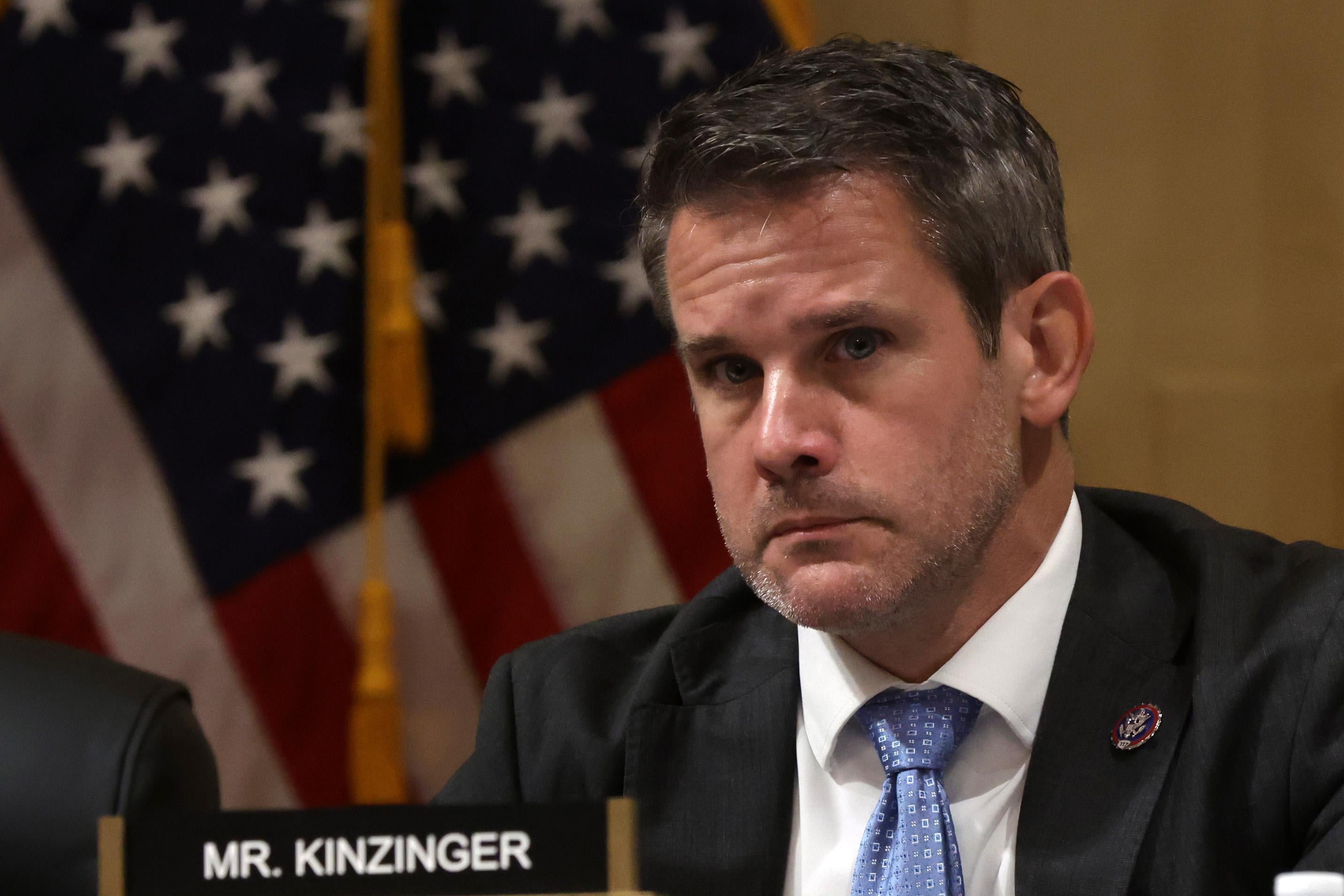 Rep. Adam Kinzinger (R-IL) listens during a select committee meeting investigating the January 6 attack on the Capitol at Cannon House Office Building on Capitol Hill October 19, 2021 in Washington, D.C.