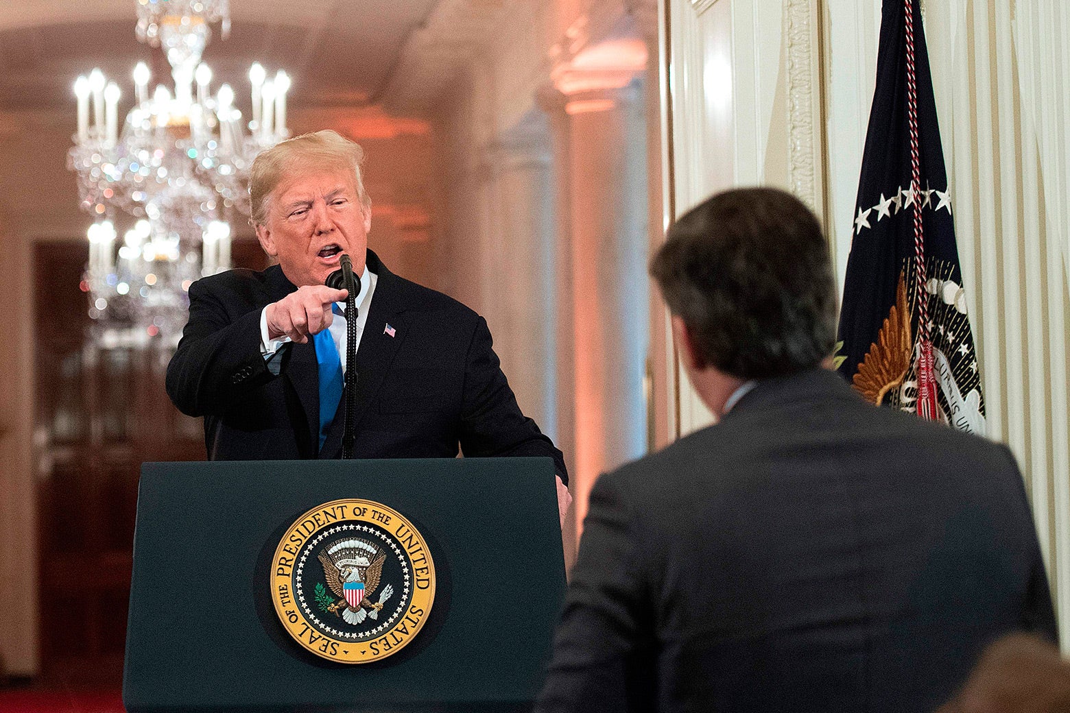 Donald Trump points angrily during a heated exchange with CNN chief White House correspondent Jim Acosta during a post-election press conference on Nov. 7.