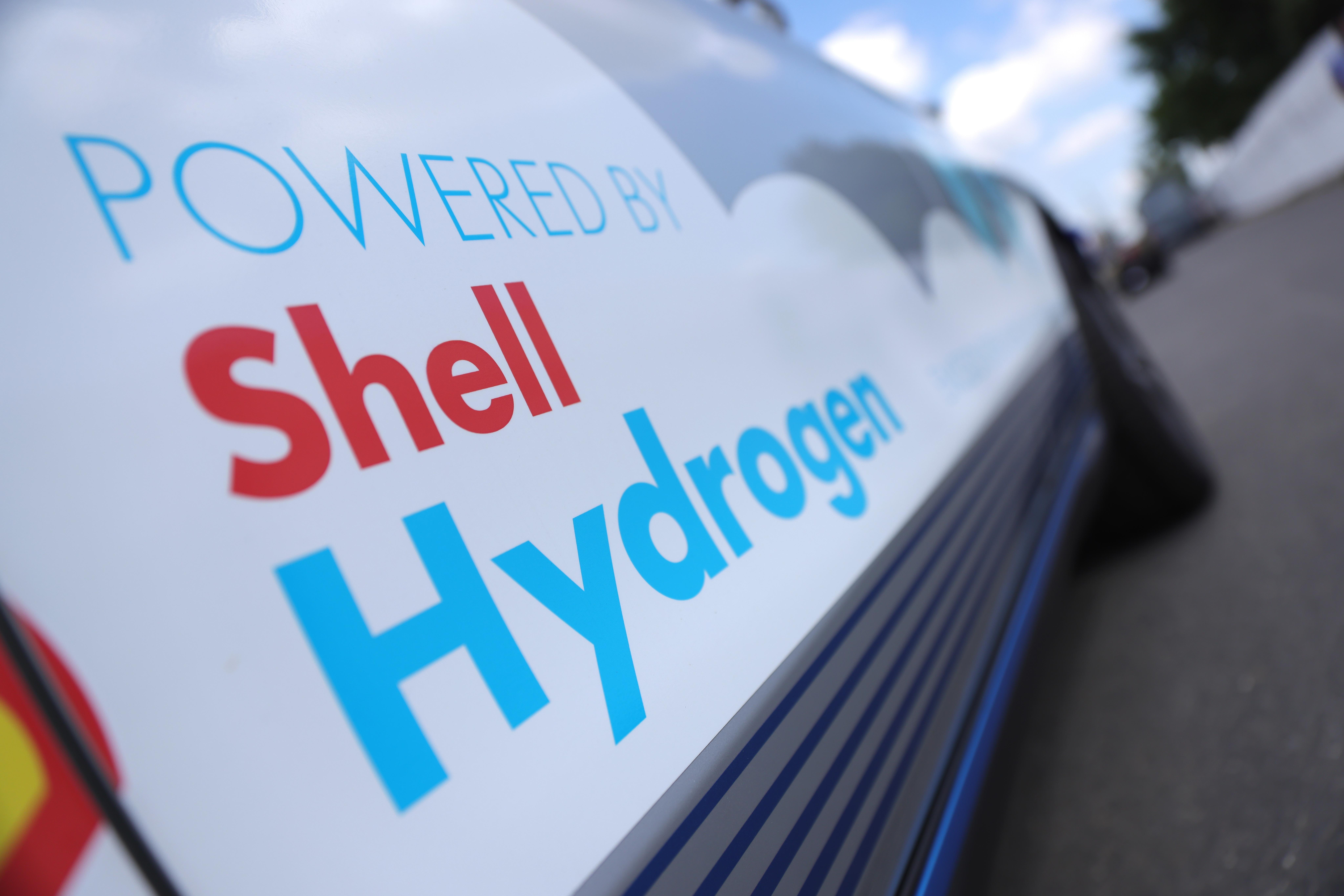 The side of a truck reads "Powered by Shell Hydrogen," with the Shell logo.