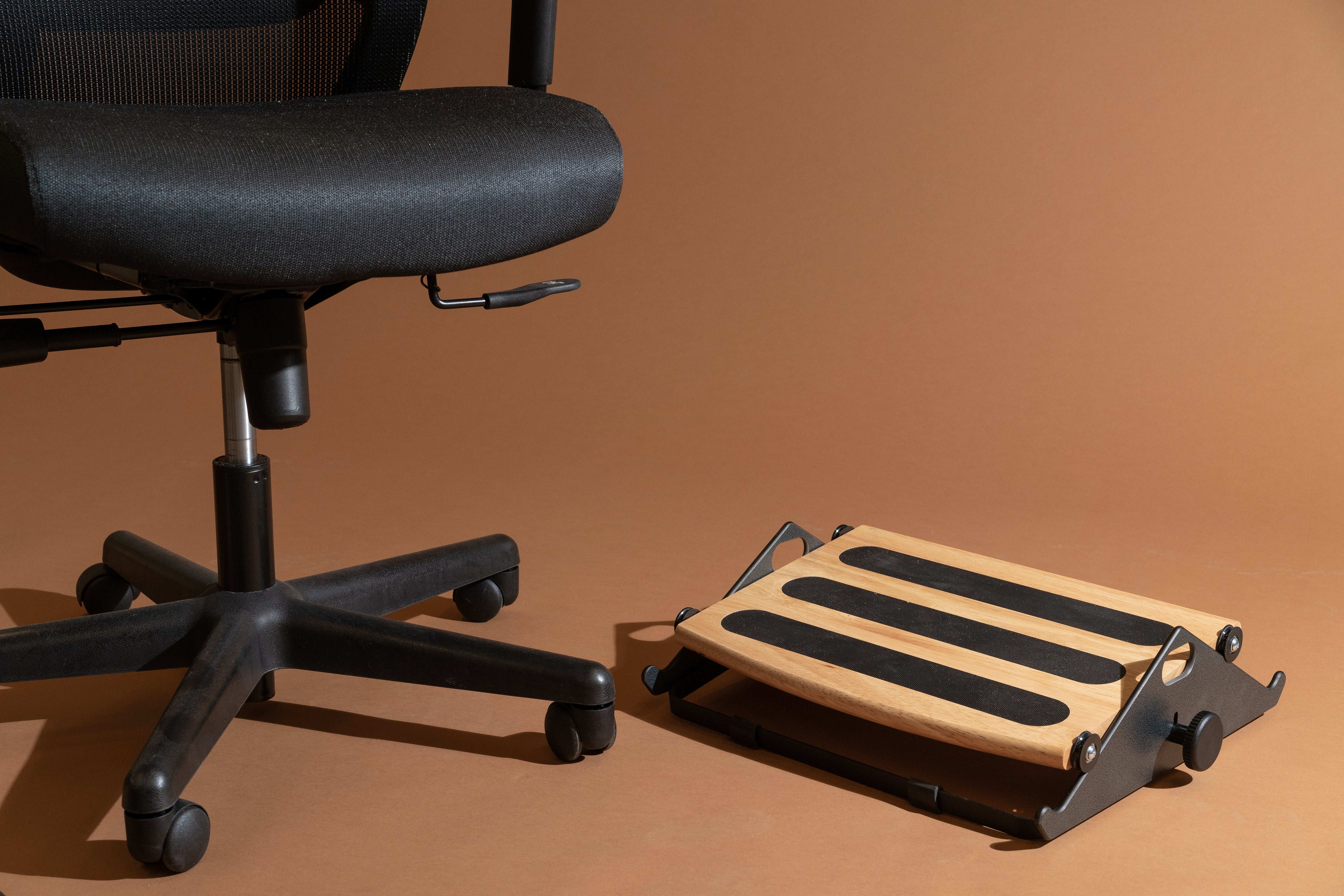 An office chair with the Humanscale FR300 Foot Rocker