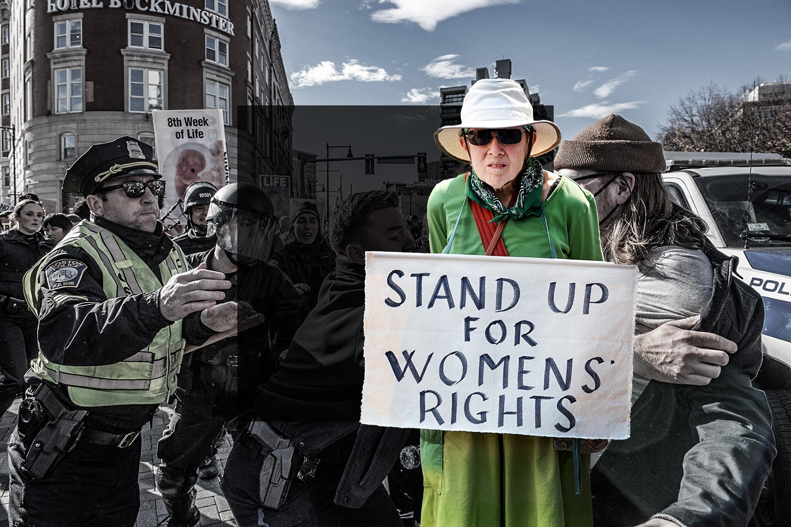 A man holds up a sign "Stand Up for Women's Rights" overlayed of an image of police confronting protesters.