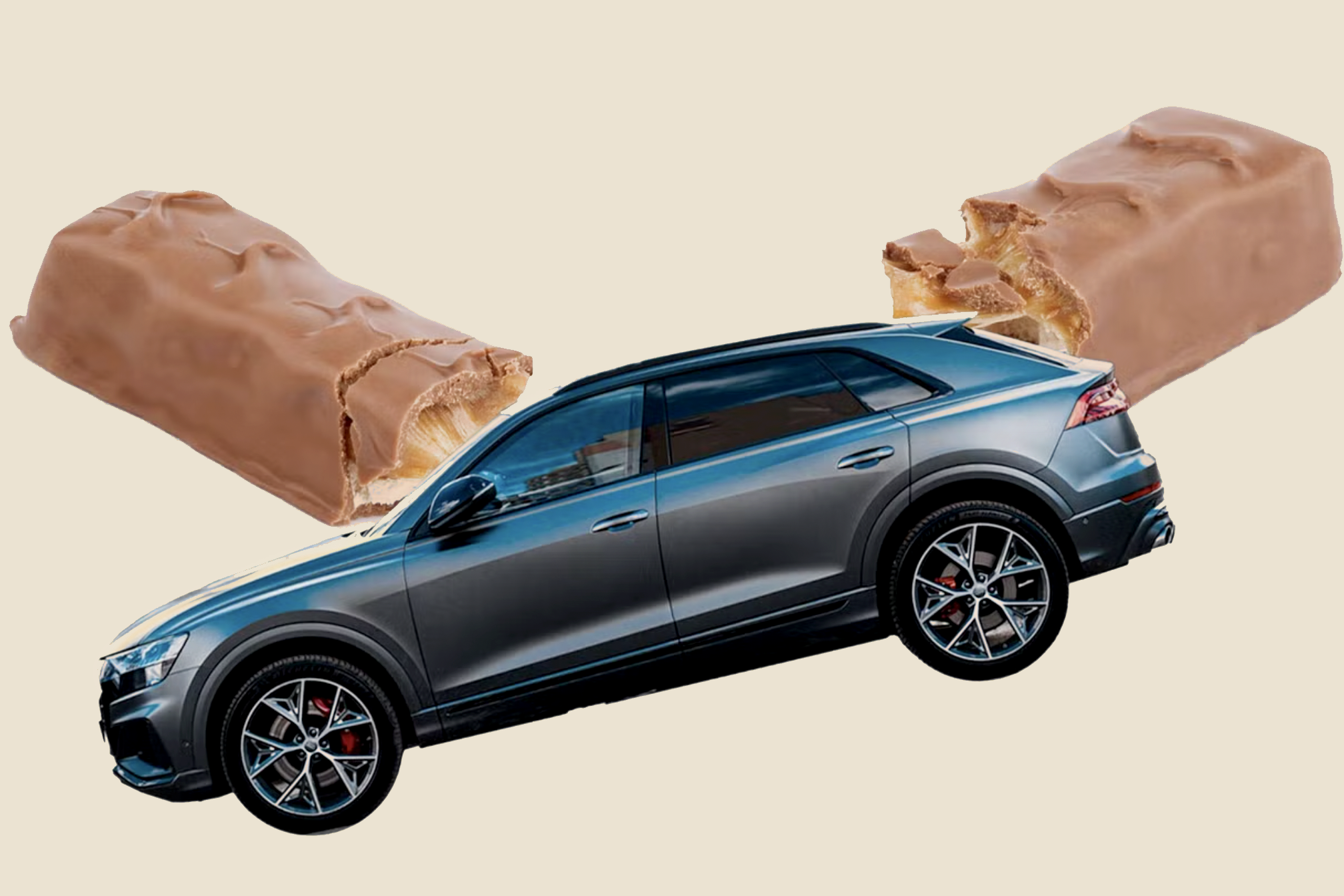 An SUV emerges from a Snickers bar.
