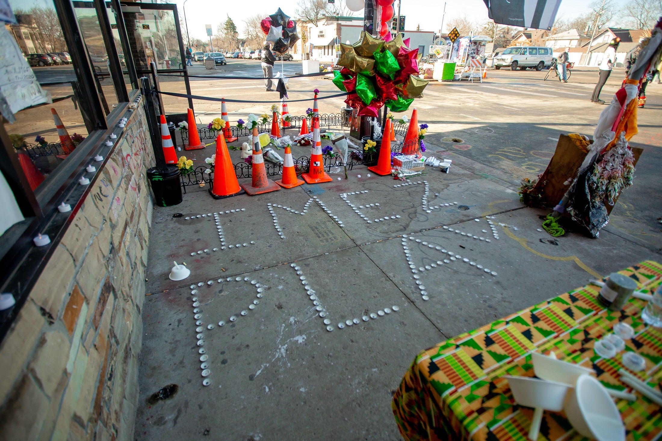 A memorial spells out the name of the shooting victim in George Floyd Square.