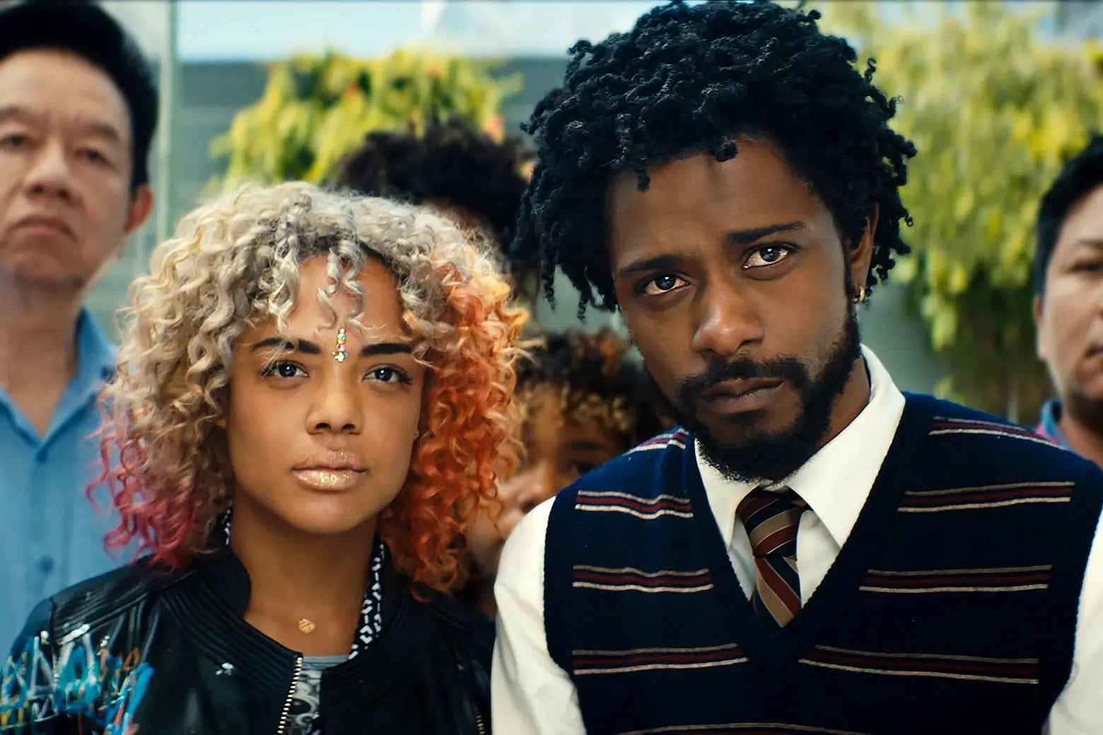 LaKeith Stanfield and Tessa Thompson standing side by side.