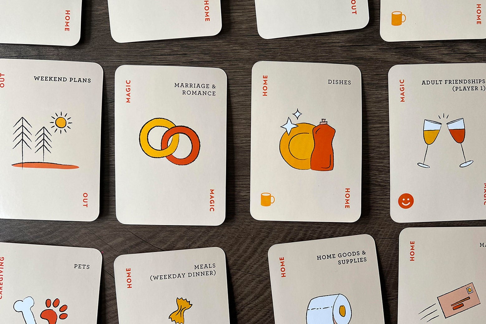 Spread of Fair Play Deck cards to divide household tasks. 