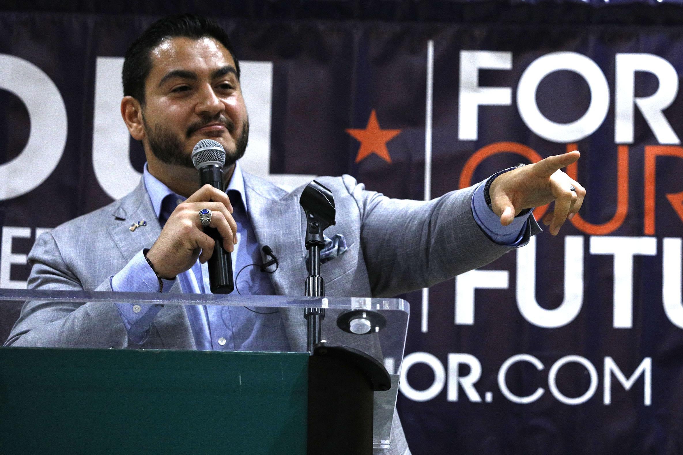 Michigan Democratic gubernatorial candidate Abdul El-Sayed campaigns with support from New York Democrat candidate for Congress Alexandria Ocasio-Cortez at a rally on the campus of Wayne State University July 28, 2018 in Detroit, Michigan. (Photo by Bill Pugliano/Getty Images)