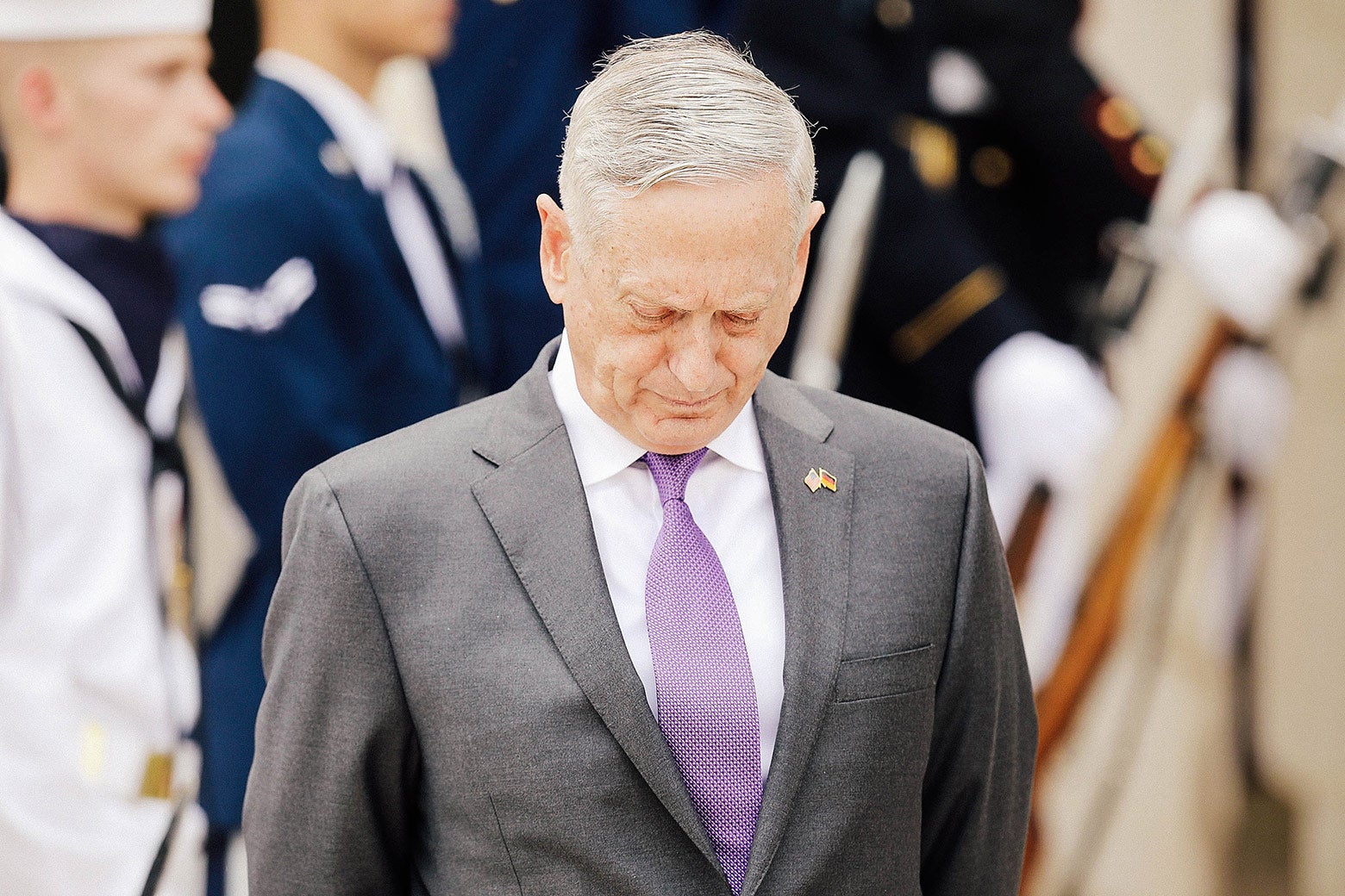 Secretary of Defense James Mattis looks at the ground as he waits for Germany's defense minister to arrive at the Pentagon in Virginia on Wednesday.