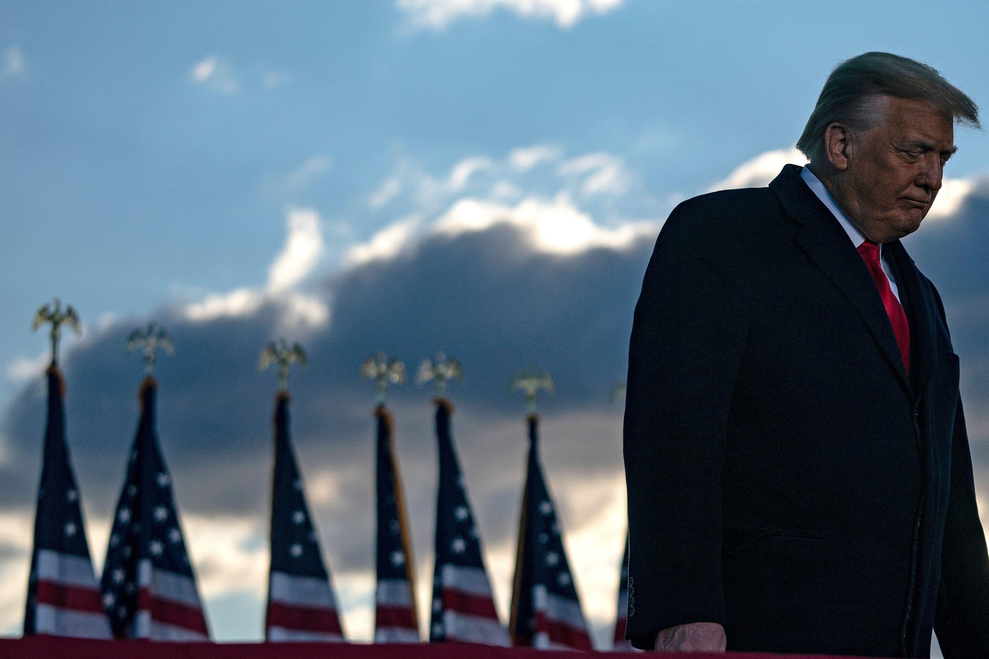 Then-outgoing President Donald Trump addresses guests at Joint Base Andrews in Maryland on January 20, 2021. 
