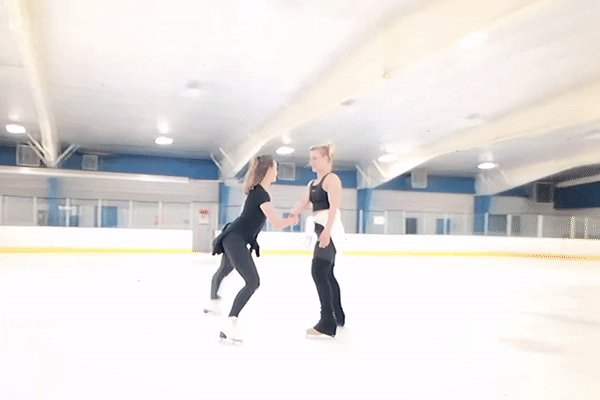 Papadakis and Hubbell skate together in a GIF.