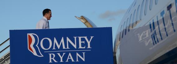Mitt Romney boards his campaign plane at West Palm Beach International airport in West Palm Beach, Fla., on Tuesday