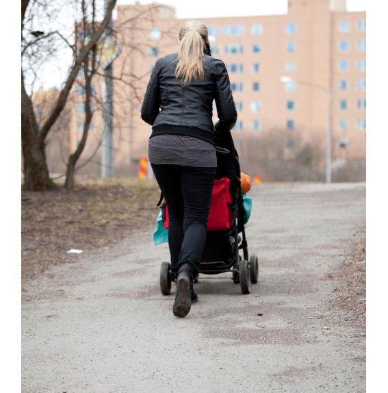 woman pushing a stroller
