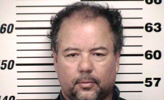 Ariel Castro, 52, is shown in this Cuyahoga County Sheriff's Office booking photo accused of kidnapping three young women and raping them during a decade of captivity.