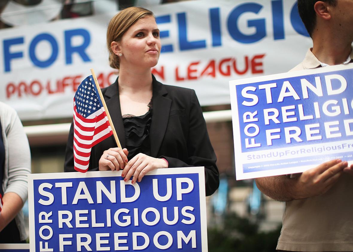 Religious freedom supporters hold a rally to praise the Supreme Court's decision in the Hobby Lobby, contraception coverage requirement case on June 30, 2014 in Chicago, Illinois. 