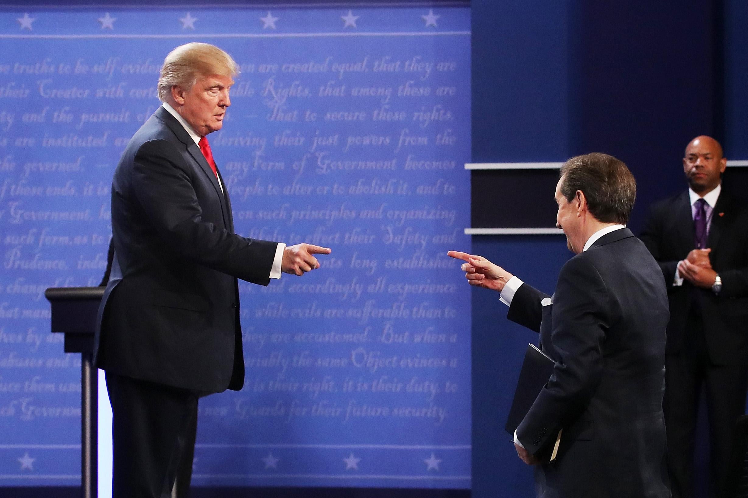 Donald Trump gestures to Fox News anchor and moderator Chris Wallace after the third U.S. presidential debate of the 2016 campaign.