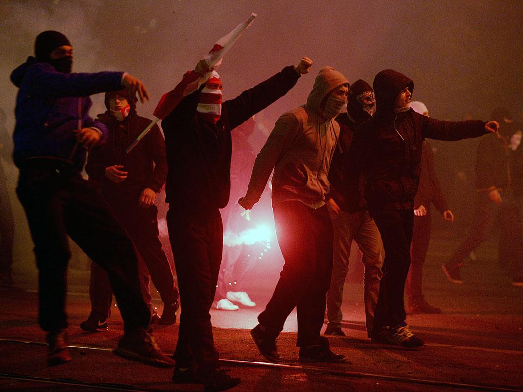 Right-wing nationalist protesters clash with the police during a far-right annual march that coincides with Poland's National Independence Day in Warsaw on Nov. 11, 2014