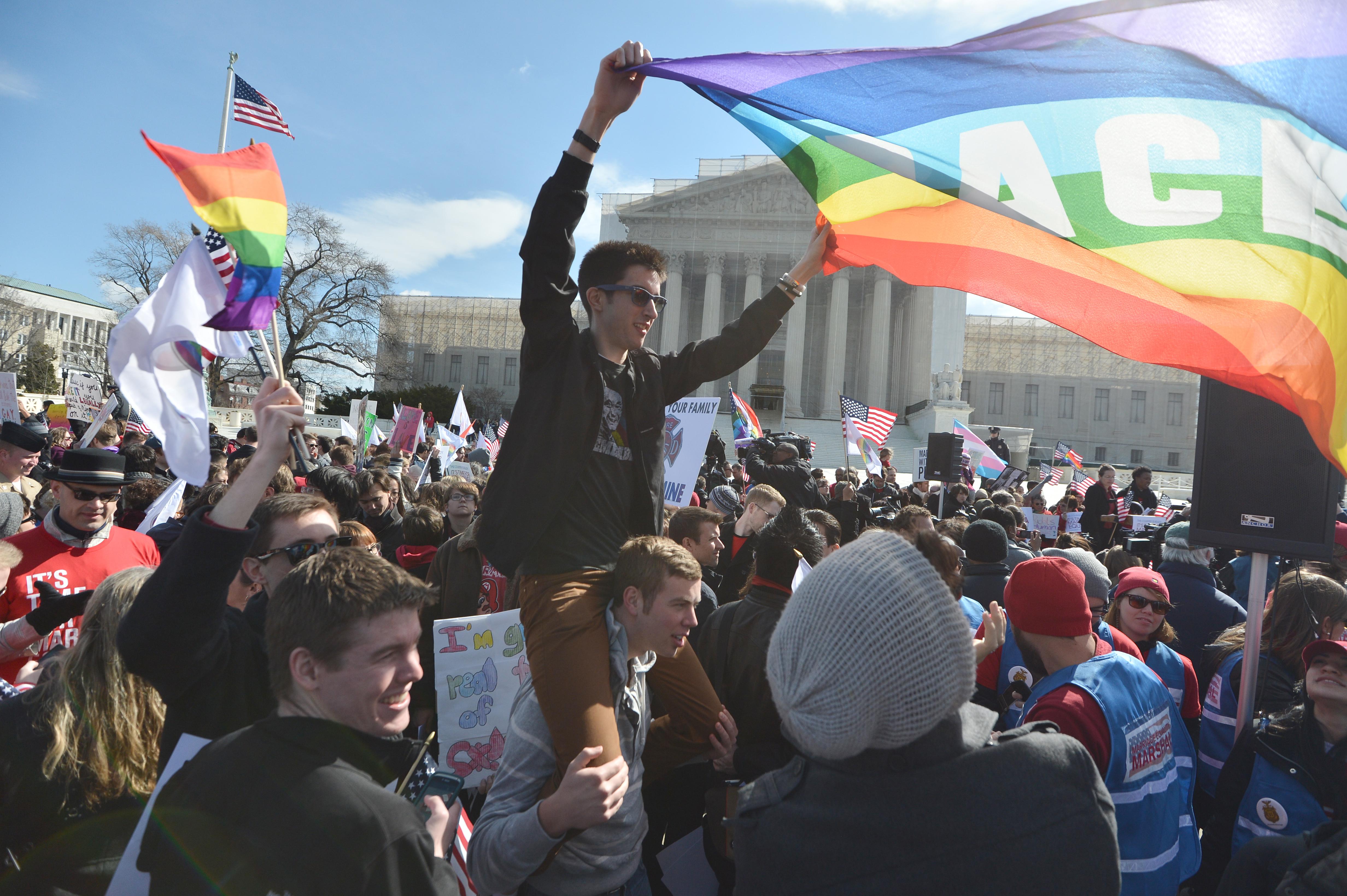 Same-sex marriage supporters demonstrate in front of the Supreme Court on March 27, 2013, in Washington, D.C.