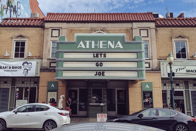 A cinema marquee with the legend "Let's Go Joe." 