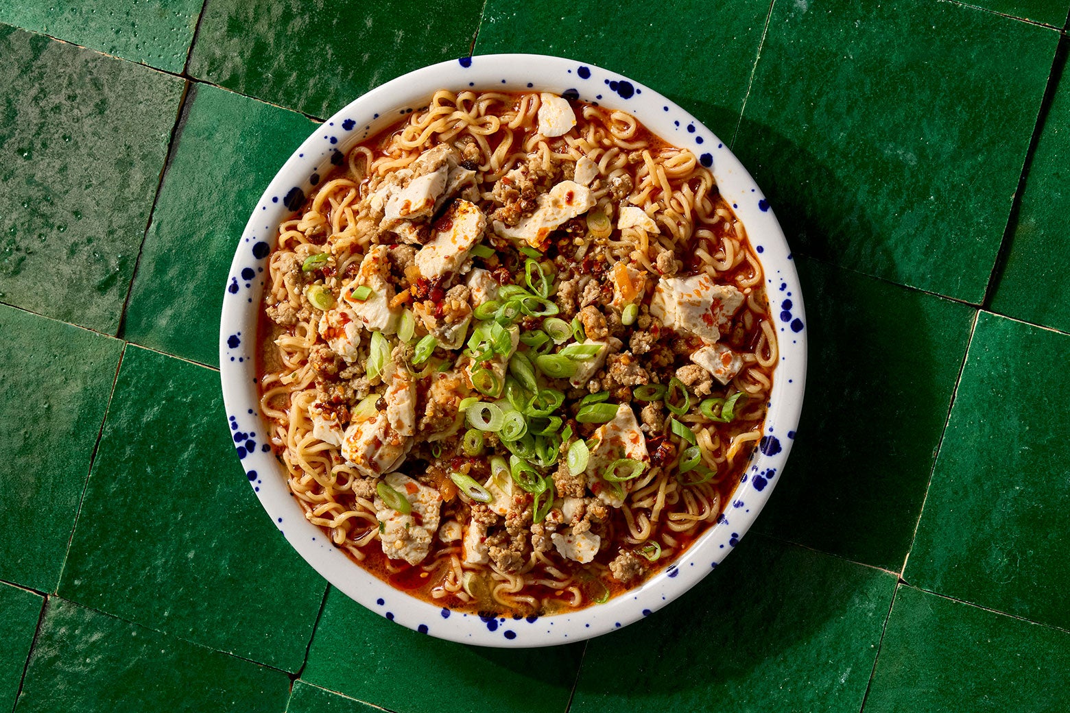 recipes A cozy-looking bowl of ramen with tofu, topped with green onion.