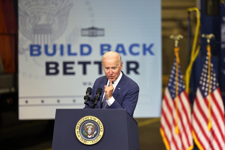 Joe Biden speaks at a lectern, in front of a sign reading "Build Back Better."