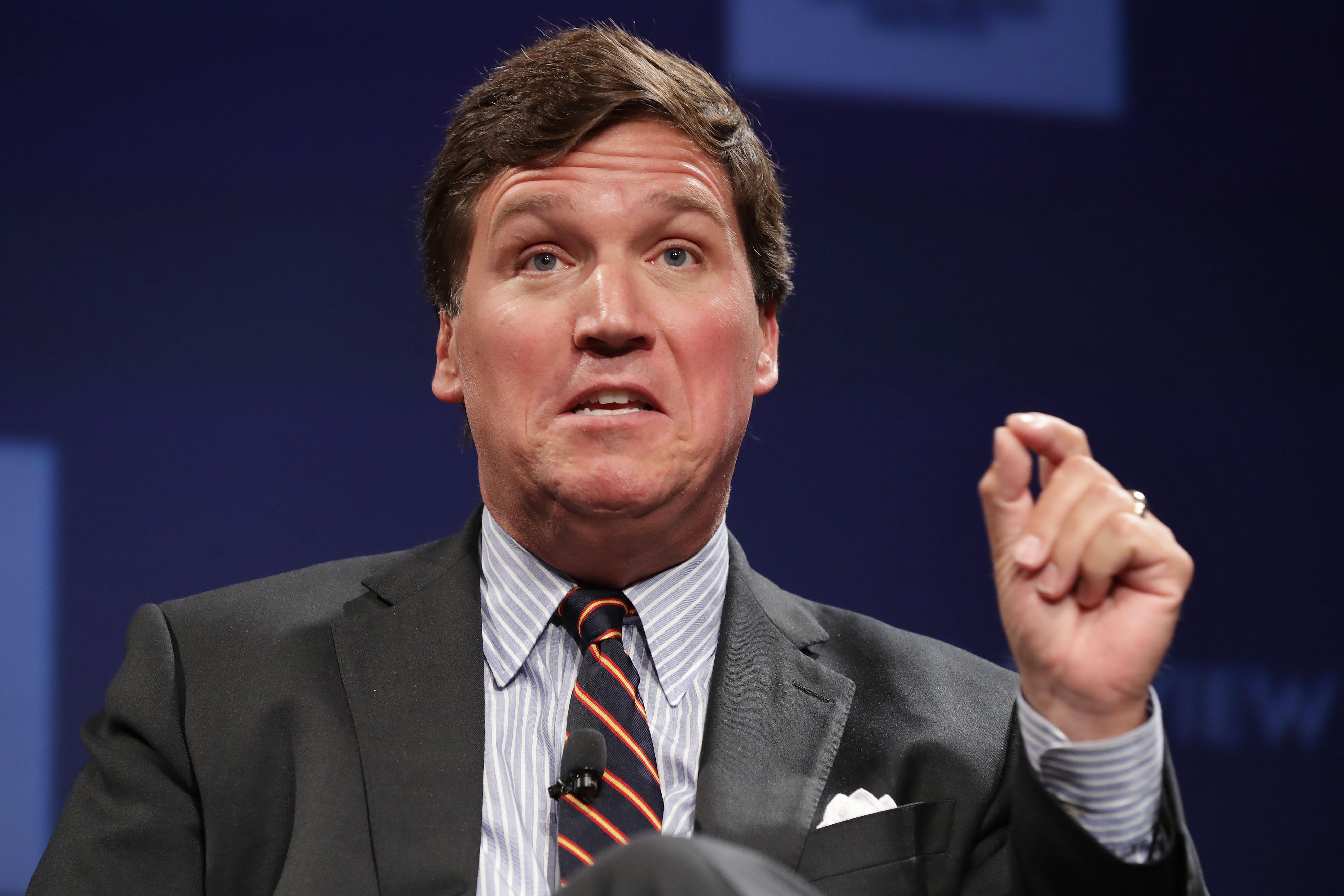 Fox News host Tucker Carlson talks during the National Review Institute's Ideas Summit at the Mandarin Oriental Hotel March 29, 2019 in Washington, D.C. 