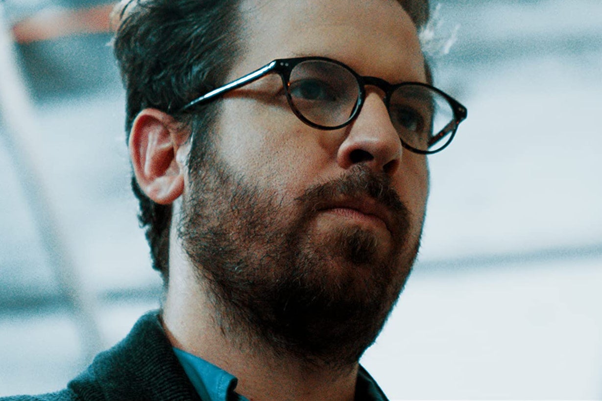 Tyler Cornack—bearded and bespectacled and looking serious—in Butt Boy