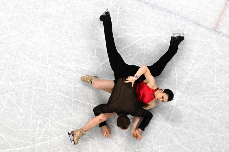 The ice dancers down on the ice.