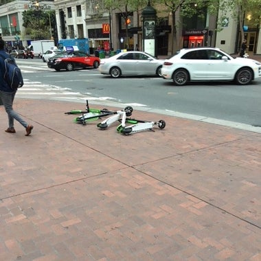 Scooters left on Market Street.