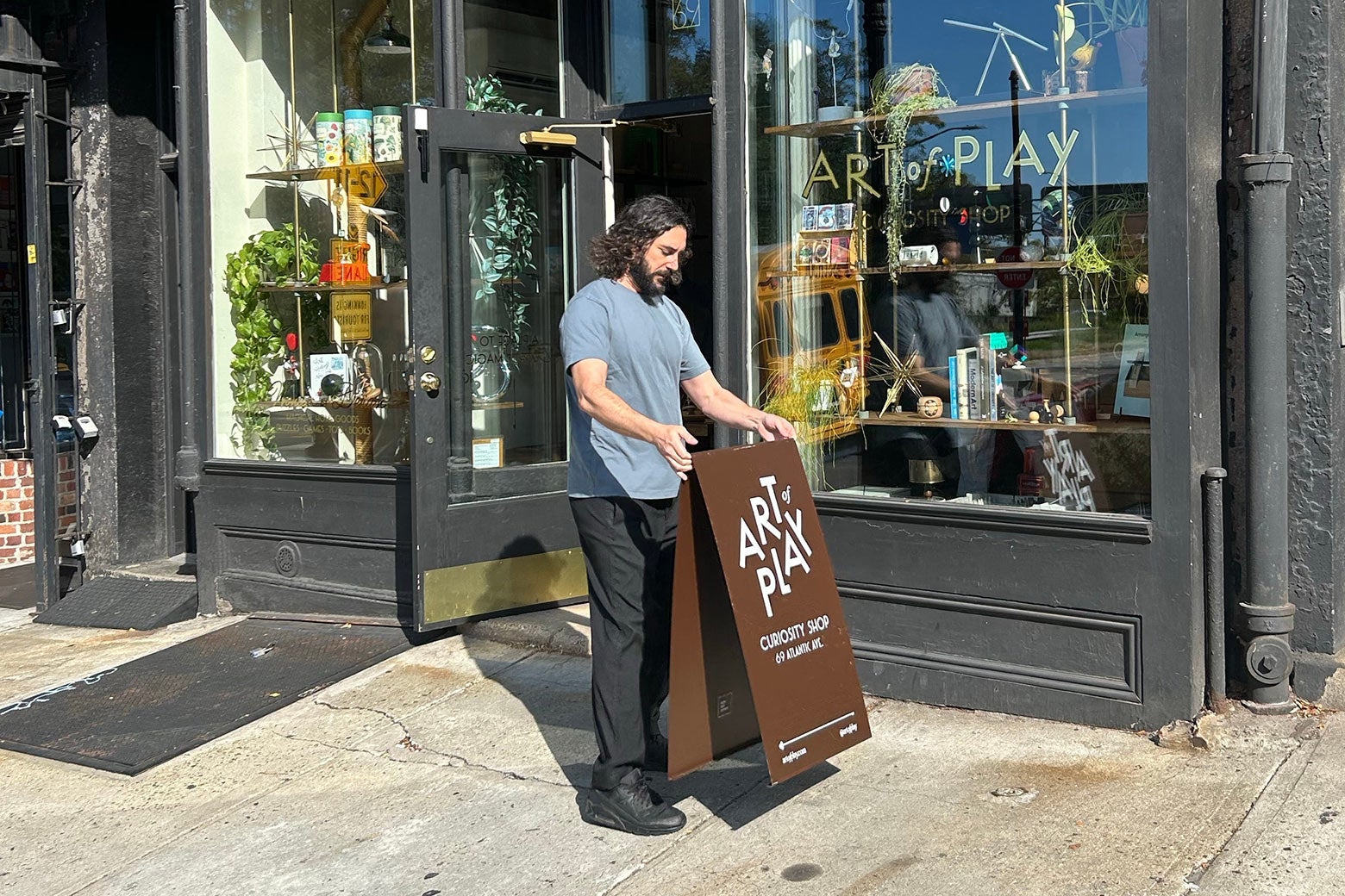 Art of Play co-owner Adam Rubin in front of his shop in Brooklyn.