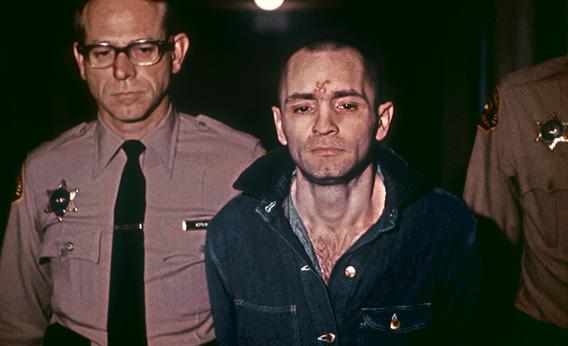Beardless and shaven-headed, Charles Manson, goes to hear sentence of death passed by the court March 29, 1971, in Los Angeles.