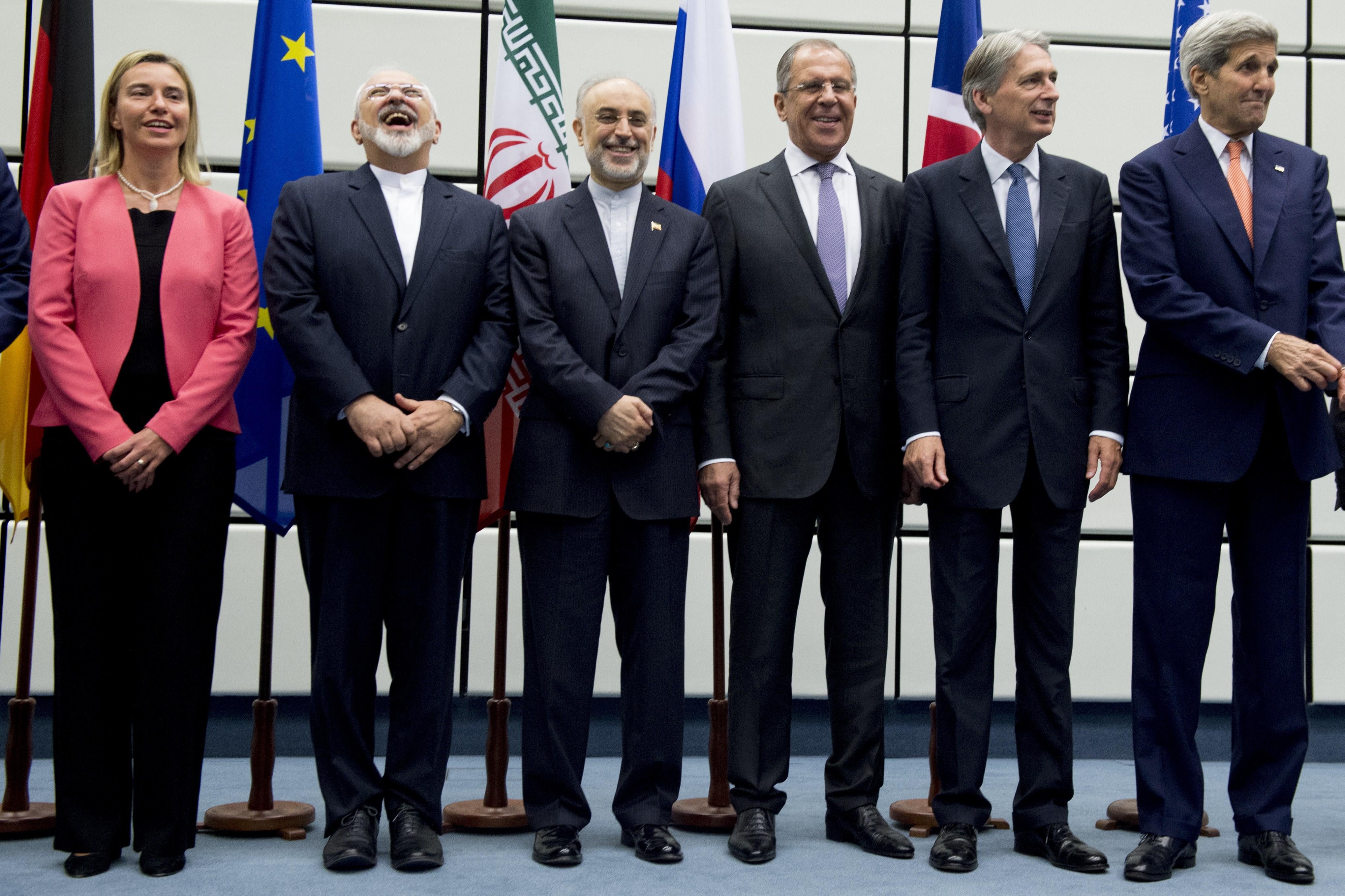 Representatives from Iran and six major powers pose for a group picture at the United Nations building in Vienna, Austria July 14, 2015, after reaching the nuclear deal. 
