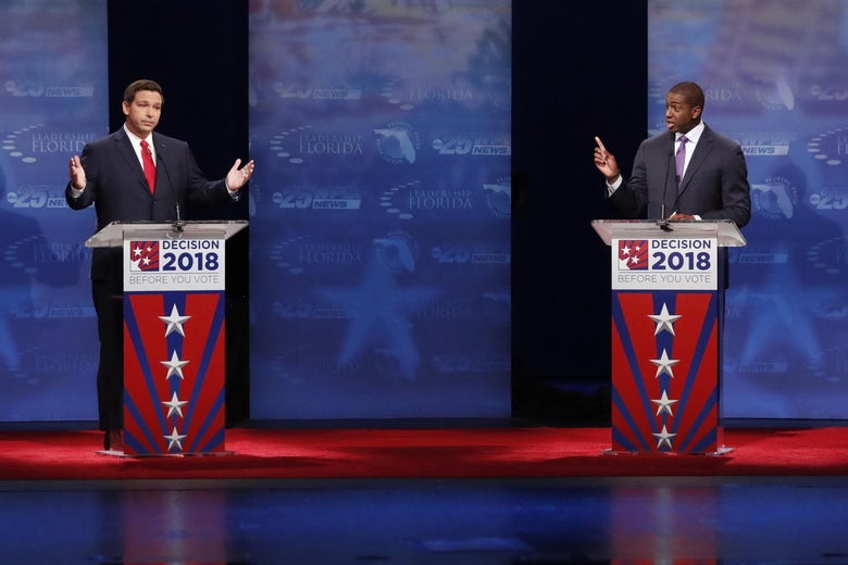 Republican Ron DeSantis (L) and Democrat Andrew Gillum debate at Broward College October 24, 2018 in Davie, Florida.