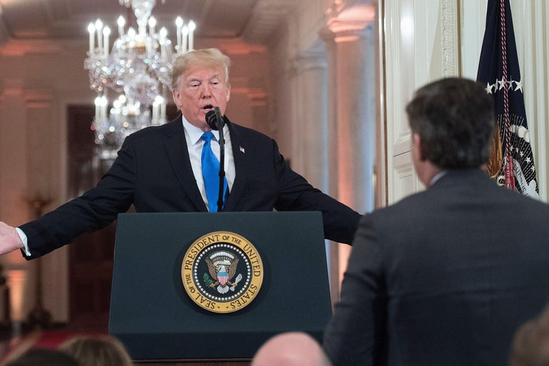 Donald Trump and Jim Acosta arguing during a press conference