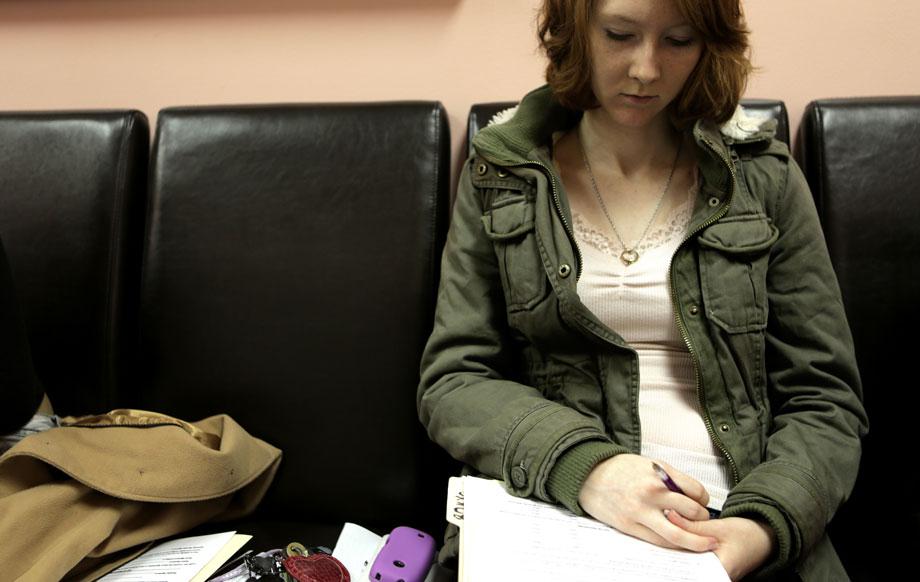 Miriam, 21, at a pre-operation appointment in November 2012. Patients are required to wait 24 hours before having an abortion. Prior to that, they must fill out paperwork, receive an ultrasound, undergo counseling and speak with a doctor about the procedure. 
