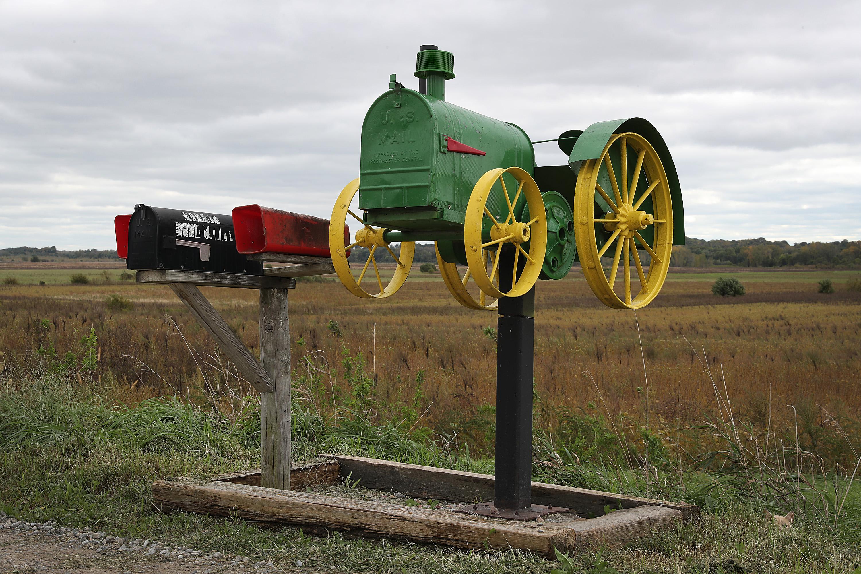 A mailbox that looks like a tractor 