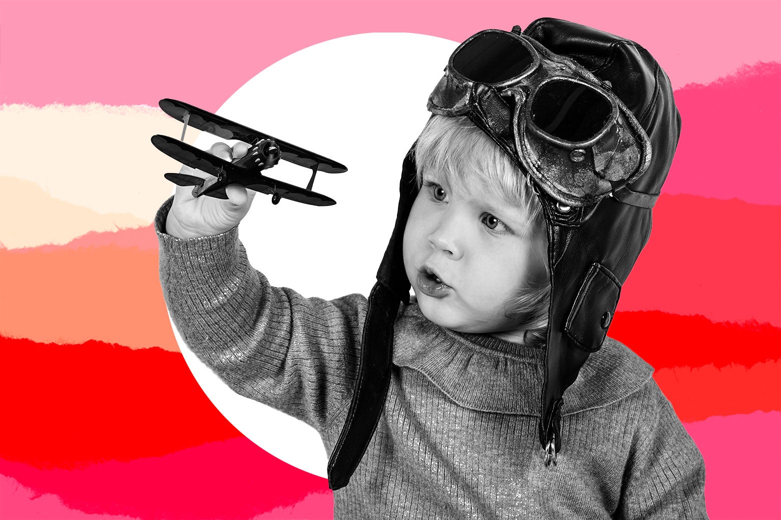 A child plays with a toy plane.
