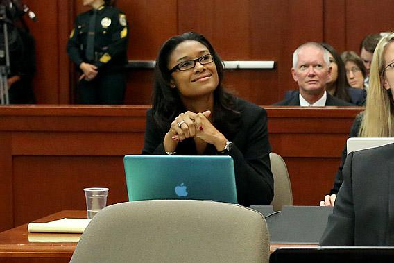 Channa Lloyd looks up at a screen displaying evidence during a recess during the George Zimmerman trial in Seminole circuit court, July 3, 2013 in Sanford, Florida.