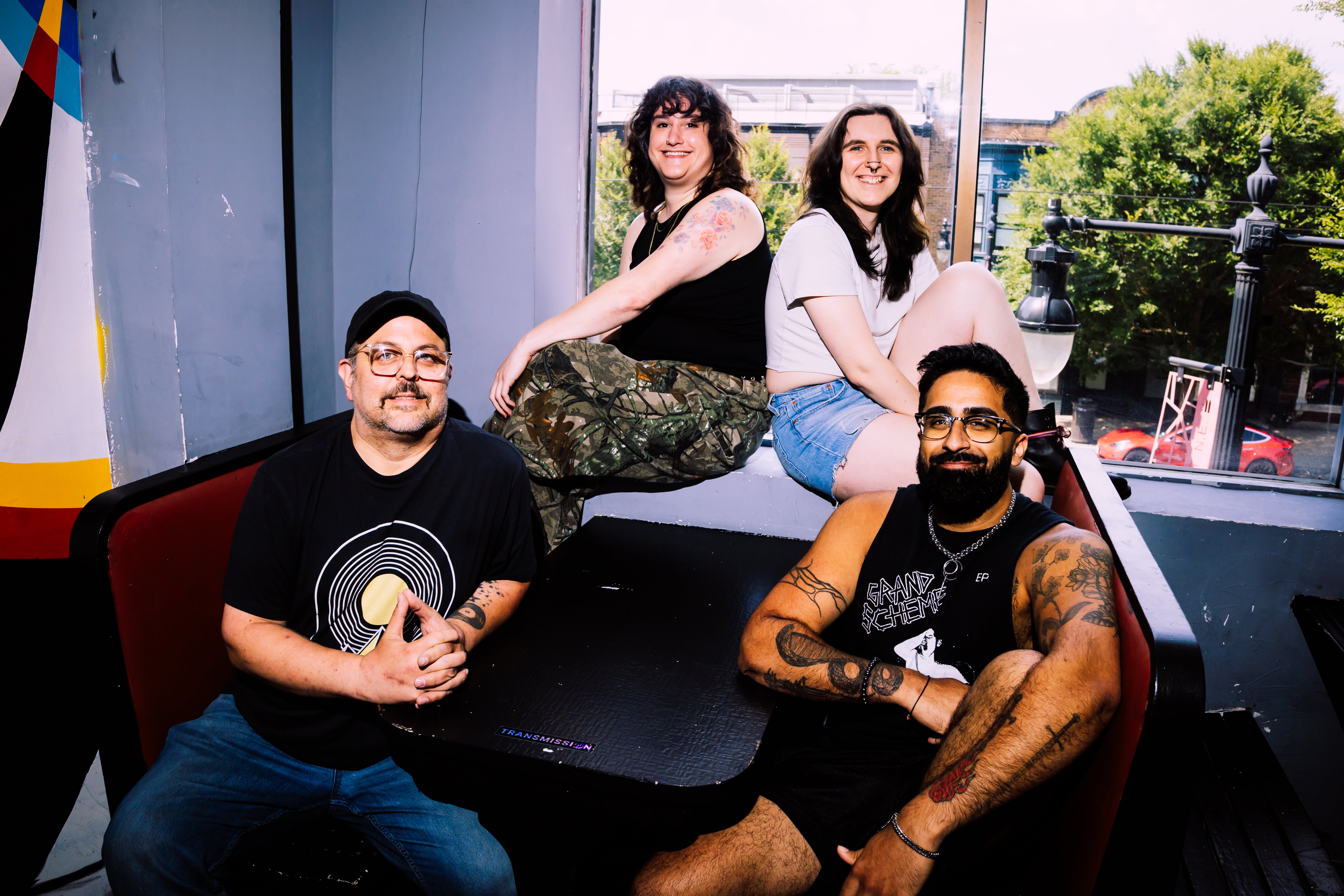The team behind Transmission poses in an office.