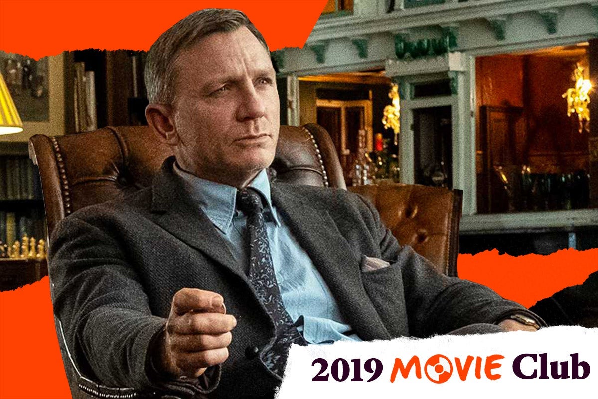 Daniel Craig in a leather chair in Knives Out.