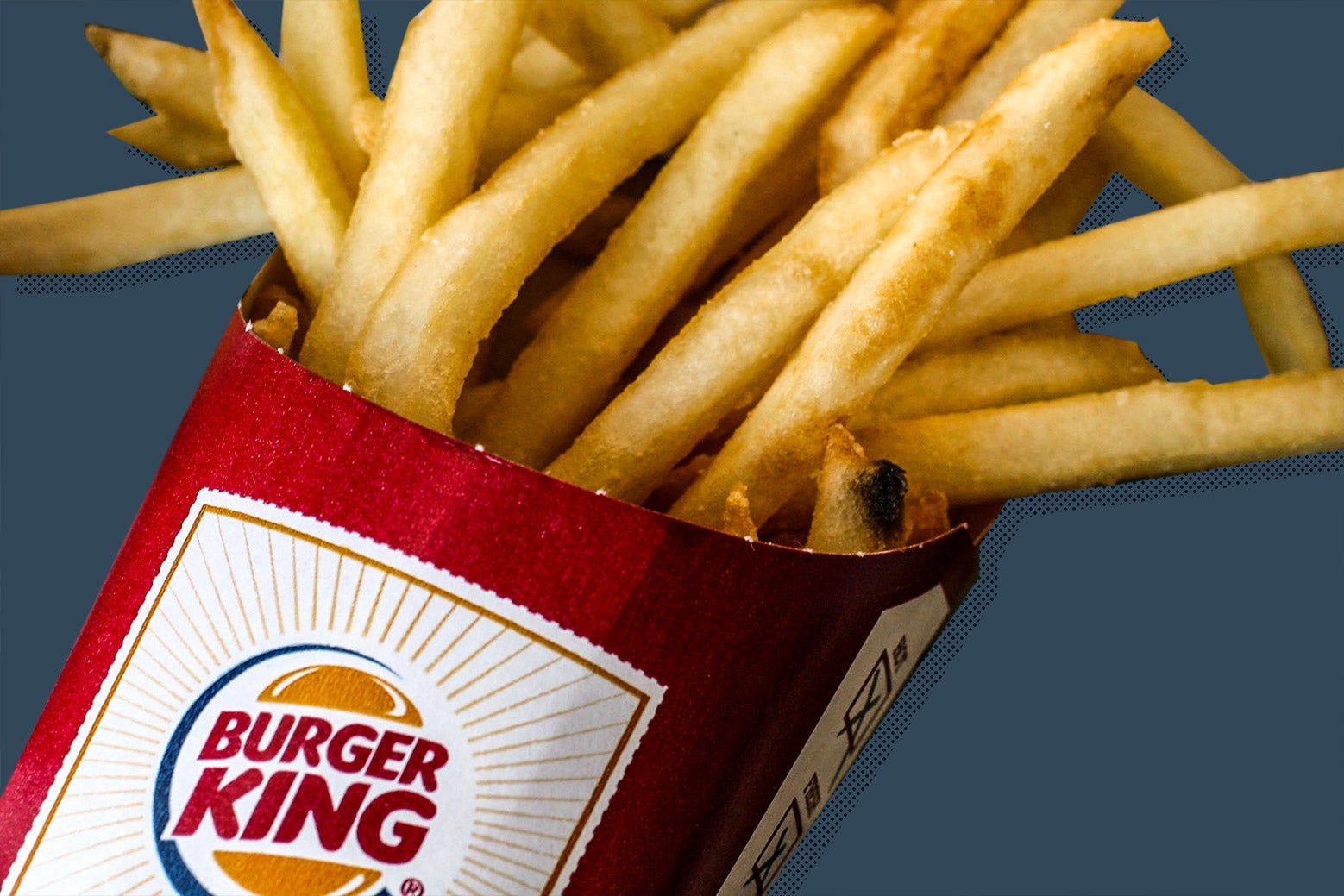 A close-up image of French fries in a red box that says Burger King.