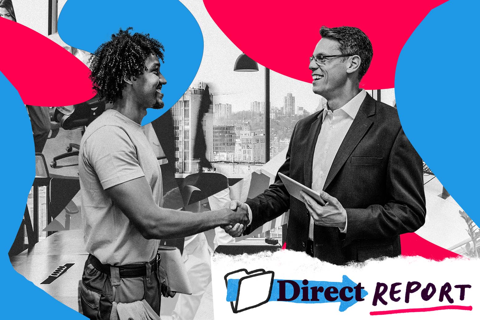 Two men in an office shaking hands.