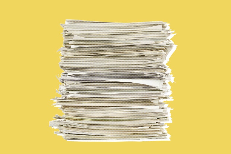 A pile of papers viewed from the side.