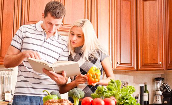 Young Couple Cooking. 