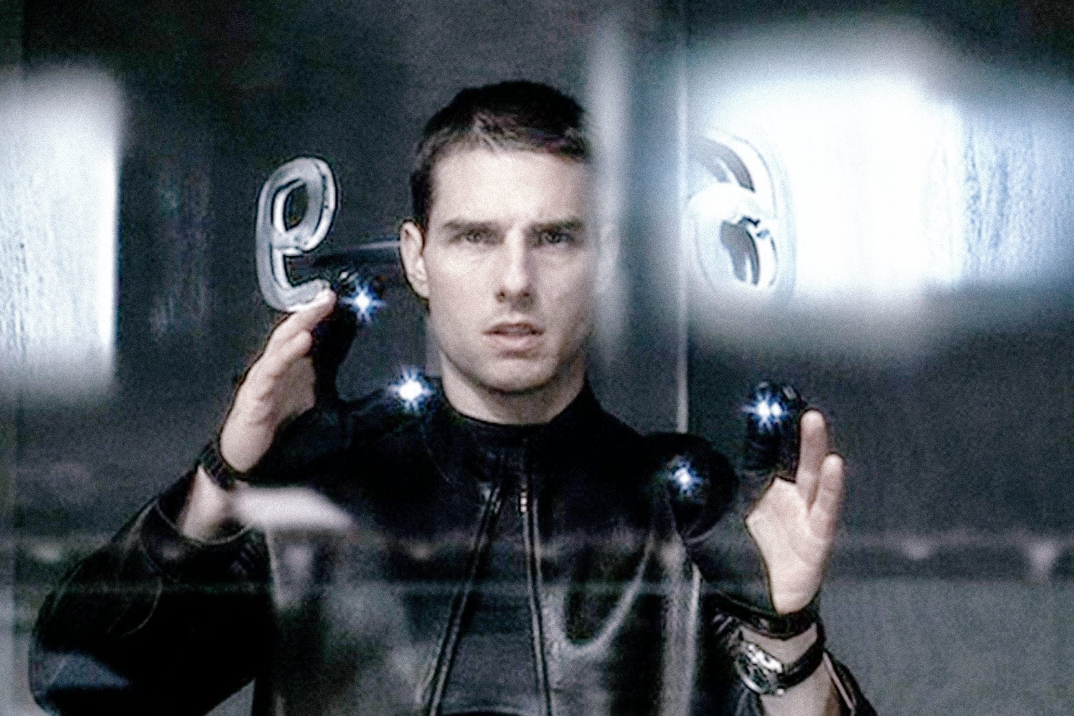 Tom Cruise wears gloves with light-emitting diodes.
