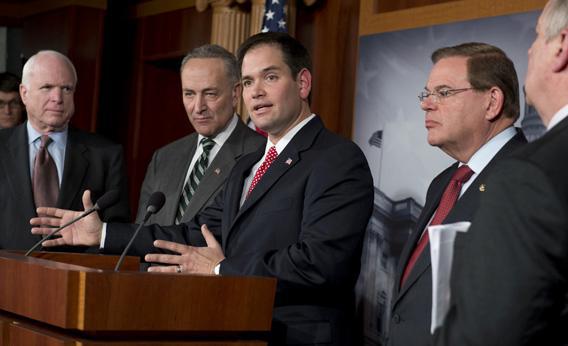 Senator Marco Rubio (C) speaks during a press conference on an agreement for comprehensive immigration reform.