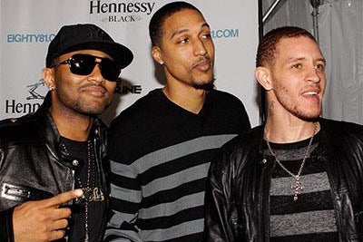 West attends an event in Chicago with teammates Jamario Moon and Mo Williams in 2010.