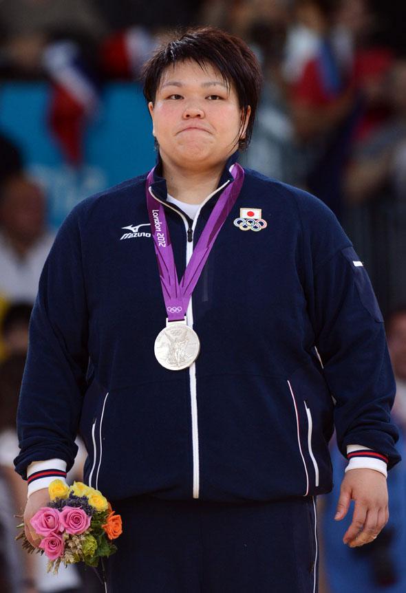 Silver medalist Japan's Mika Sugimoto poses on the podium of the women's +78kg judo contest.