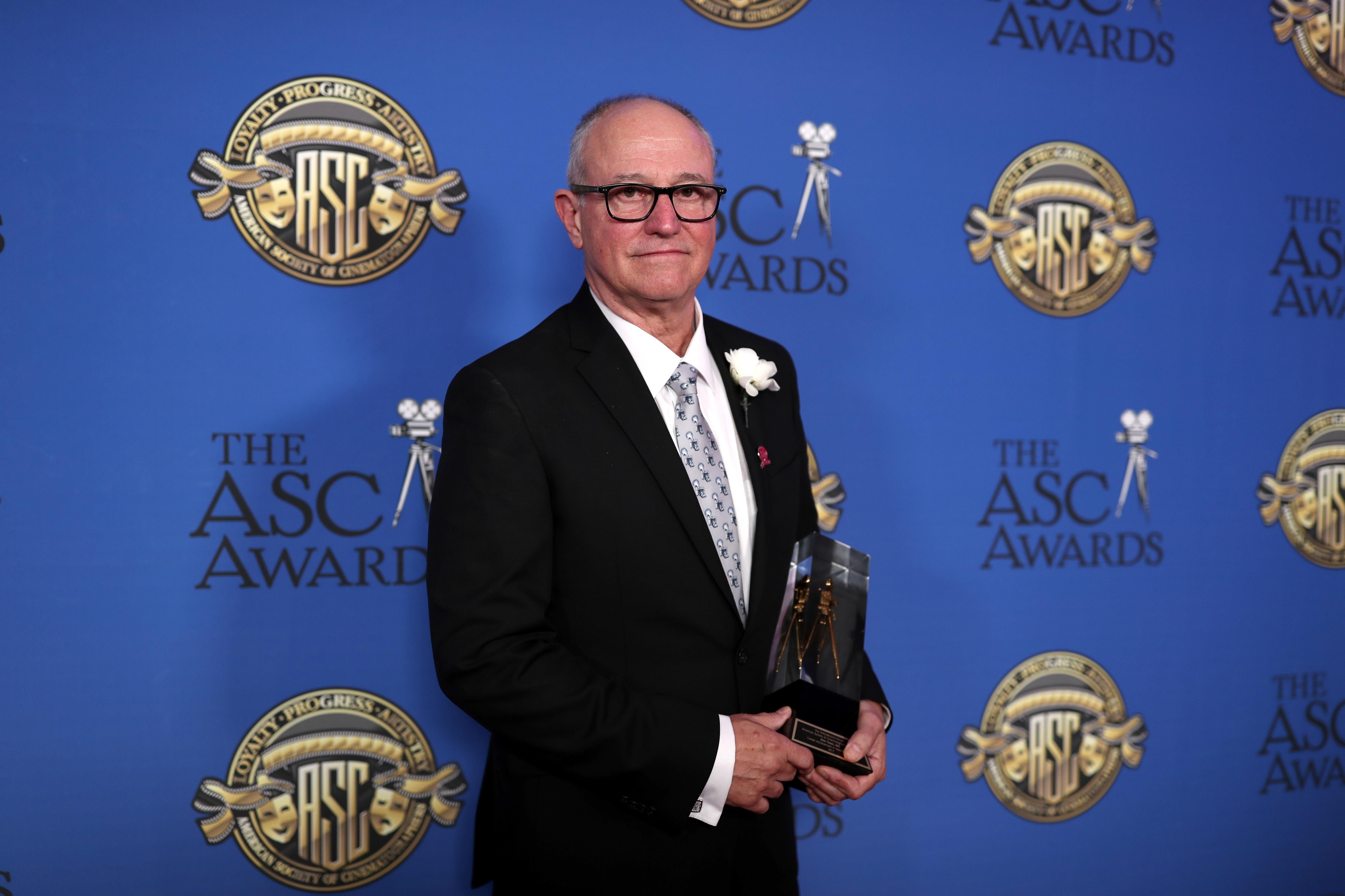 Alan Caso poses with the Career Achievement in Television Award during the 32nd Annual American Society Of Cinematographers Awards.