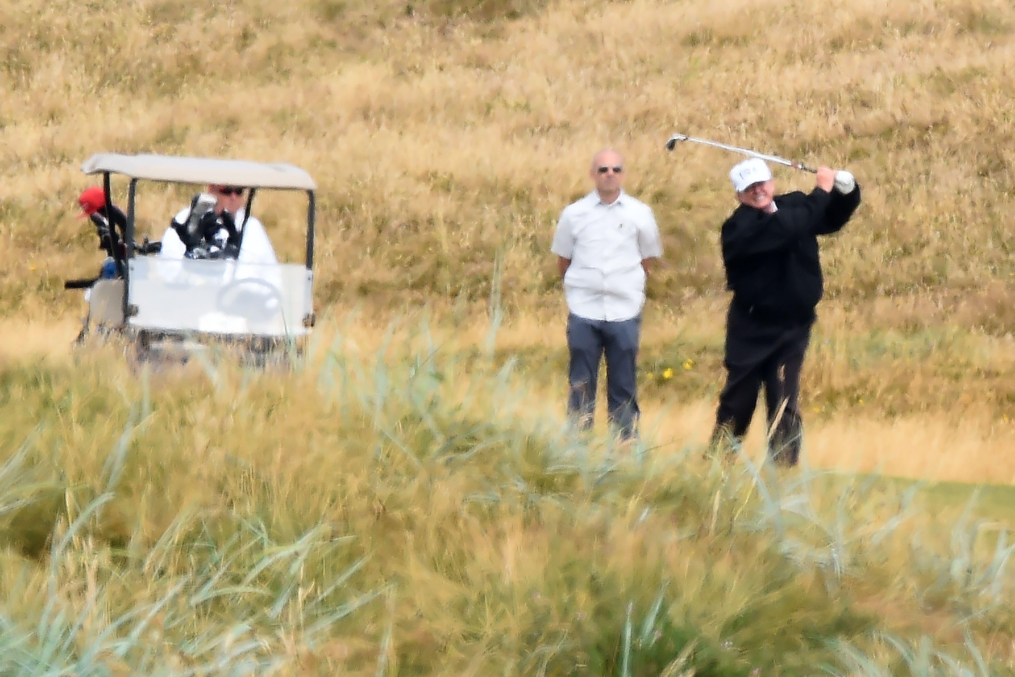 President Donald Trump plays a round of golf at Trump Turnberry on July 14, 2018.