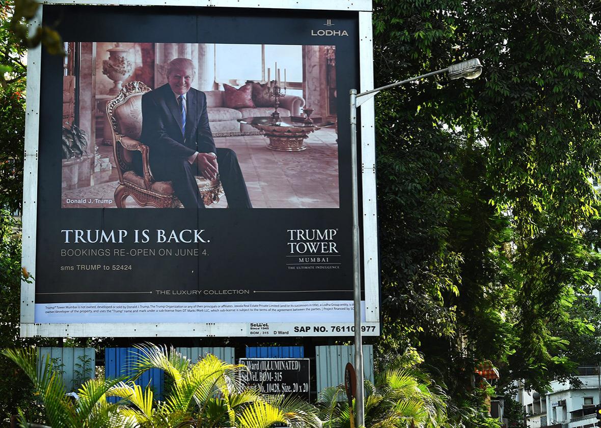 A billboard for the upcoming luxury residential apartment complex Trump Tower Mumbai, which bears the name of billionaire real estate tycoon and US presidential hopeful Donald Trump, is seen next to a busy road in Mumbai on June 3, 2016. 