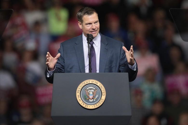 Failed Republican gubernatorial candidate Kris Kobach speaks at a rally with President Donald Trump in Topeka, Kansas.